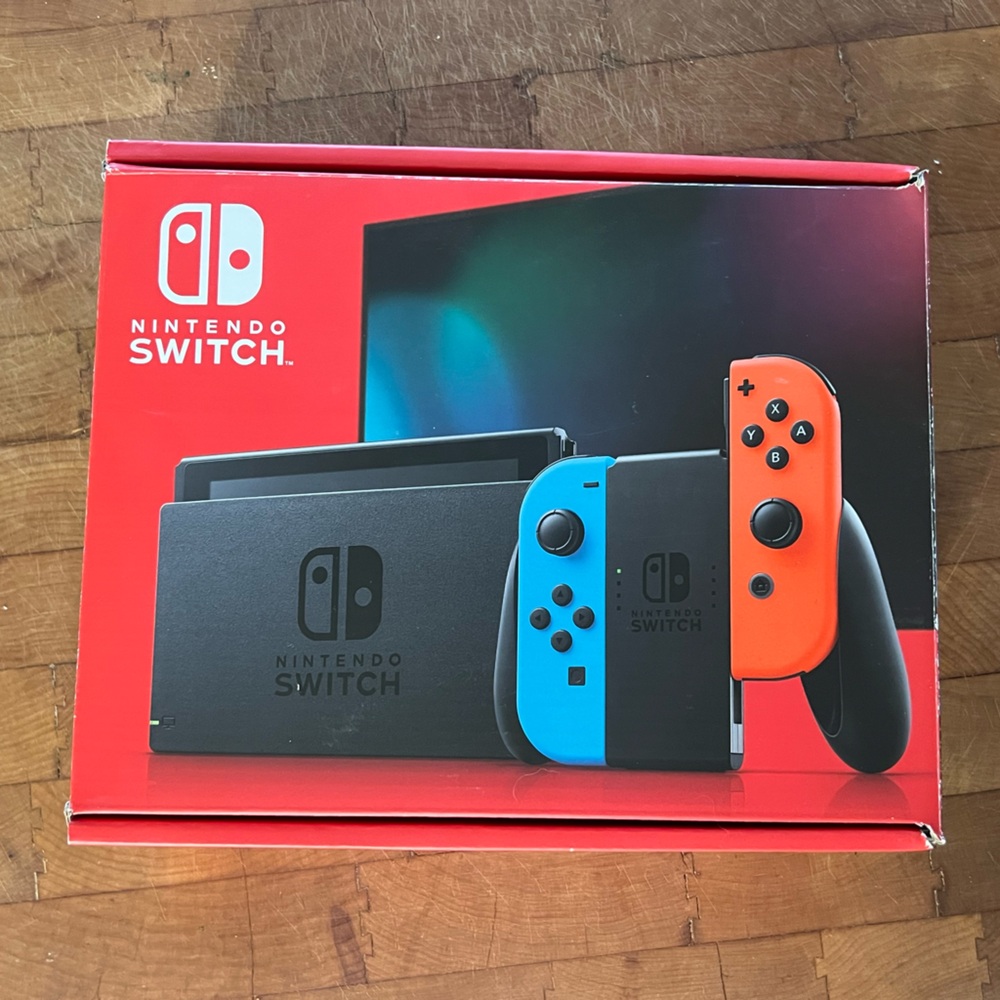 Nintendo Switch Console with Blue and Red Joy-Con